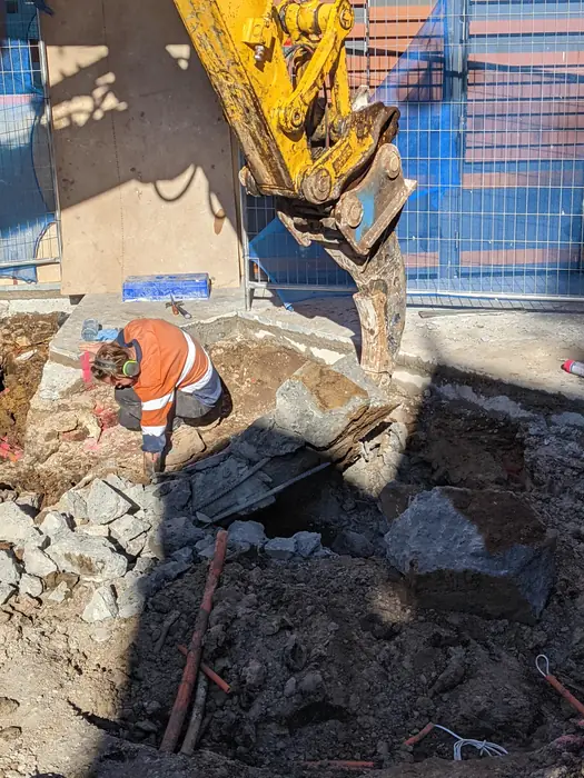 Site works in a restricted access yard